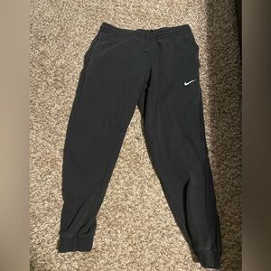 Nike Sweatpants size large. Slightly faded, but good condition.